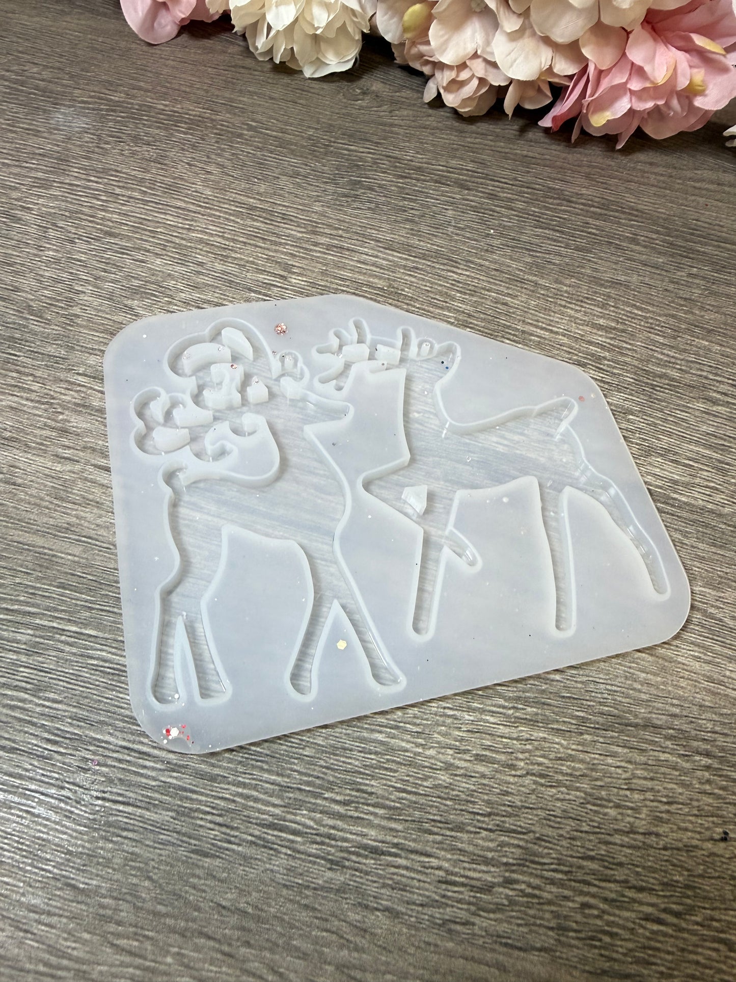 Silikonform für einen weihnachtlichen Rentier-Fensteranhänger